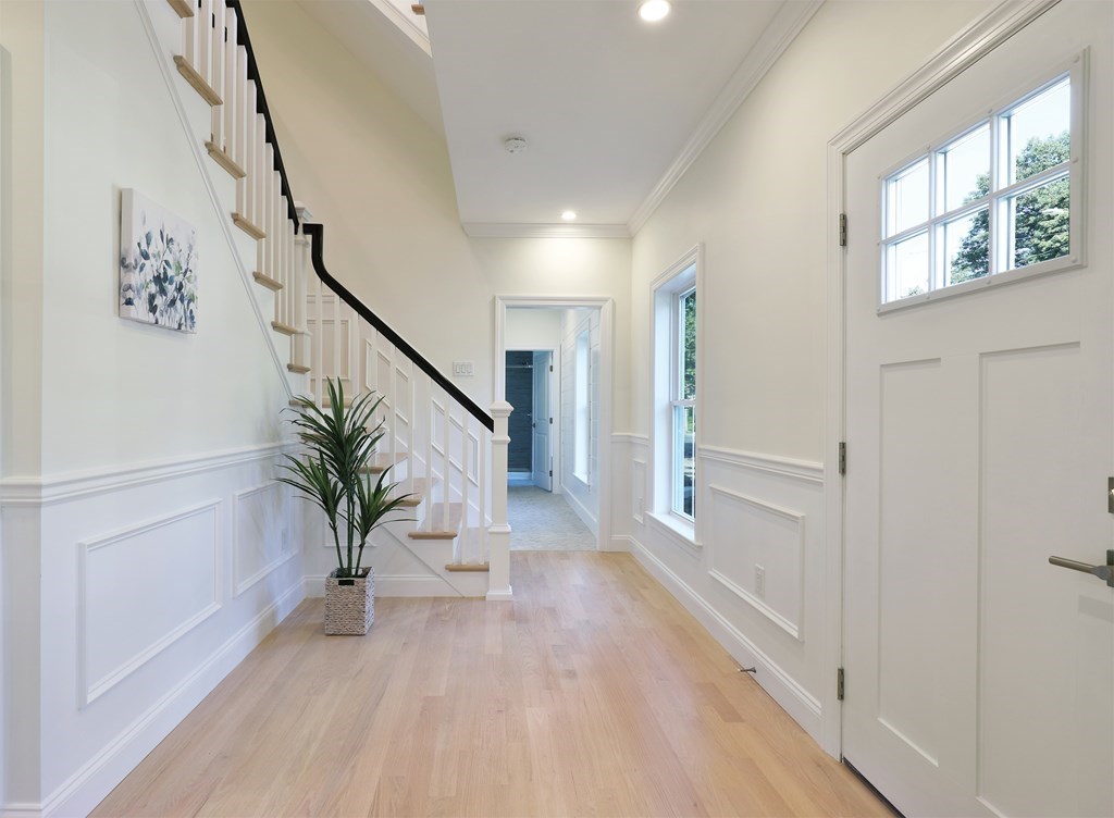 134 Spiers Road Newton, MA 02459 - Photo 3 of 38 a view of entryway with wooden floor and window