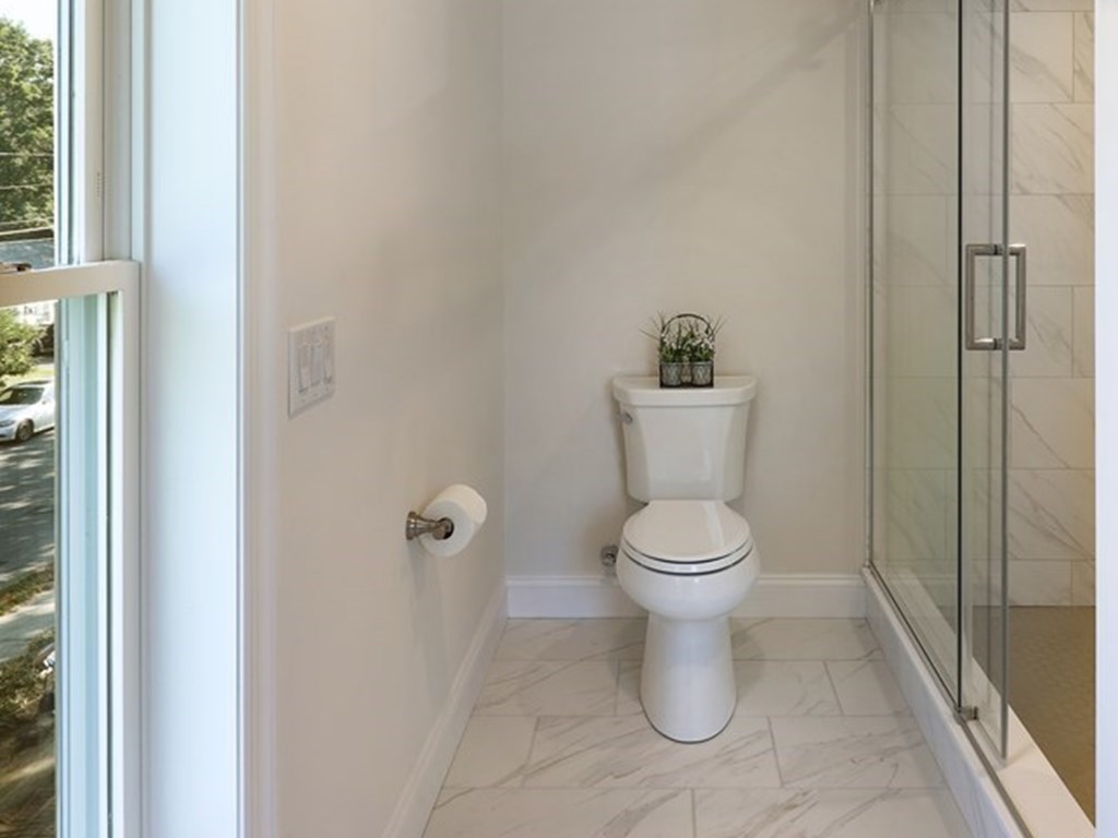 134 Spiers Road Newton, MA 02459 - Photo 31 of 38 a bathroom with a toilet and a shower