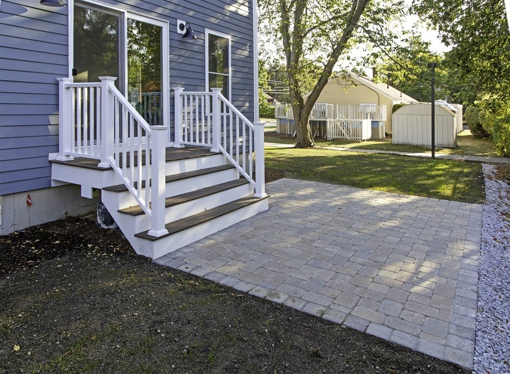 134 Spiers Road Newton, MA 02459 - Photo 36 of 38 a view of a house with a yard and fence