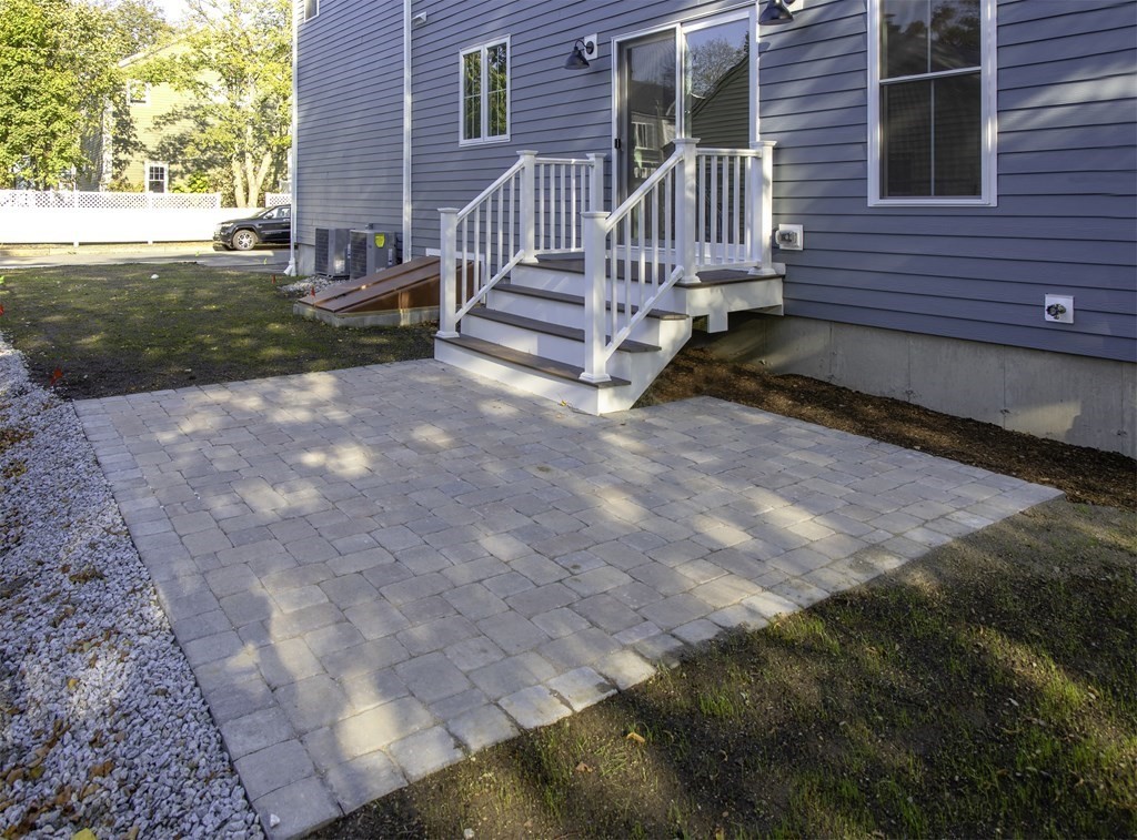 134 Spiers Road Newton, MA 02459 - Photo 37 of 38 a view of a house with backyard and sitting area