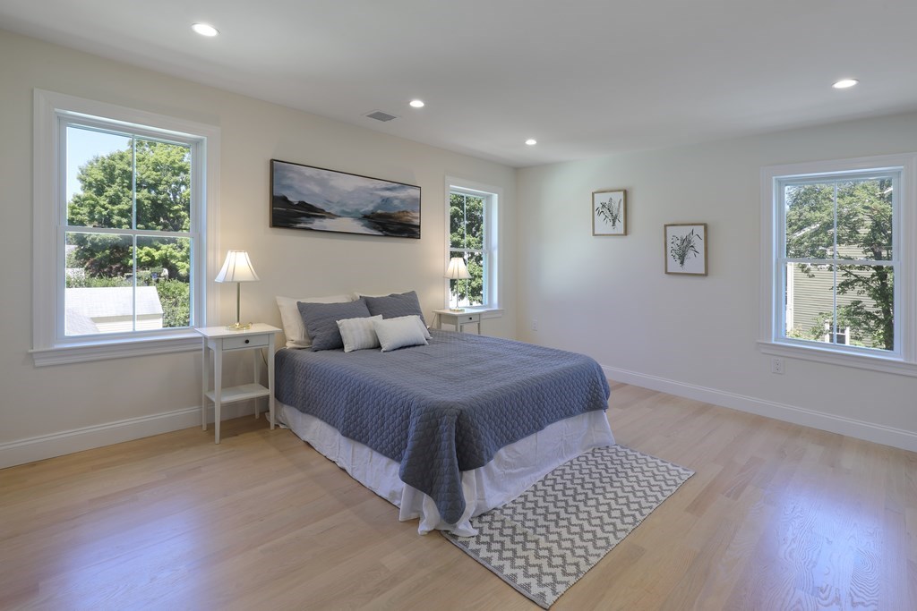 134 Spiers Road Newton, MA 02459 - Photo 6 of 38 a bedroom with a large bed and a window
