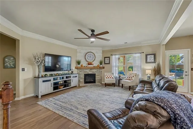 a large kitchen with a table and chairs
