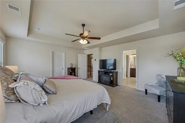 a bathroom with a sink double vanity and a mirror