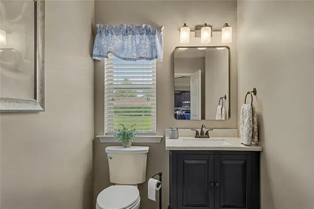 a view of a lake with a house in the background