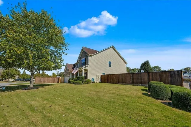 a view of kitchen with furniture and natural light