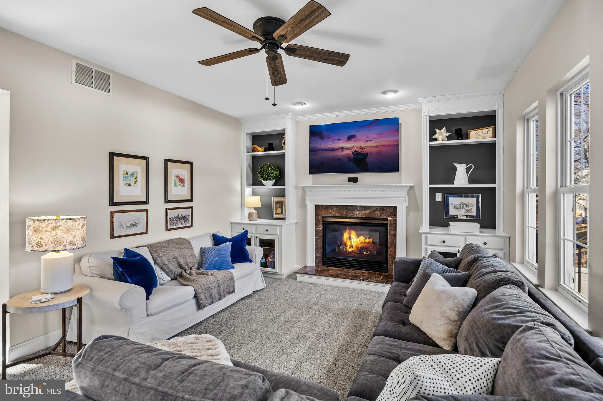 4907 Church Road Mount Laurel, NJ 08054 - Photo 11 of 49 a living room with furniture and a fireplace
