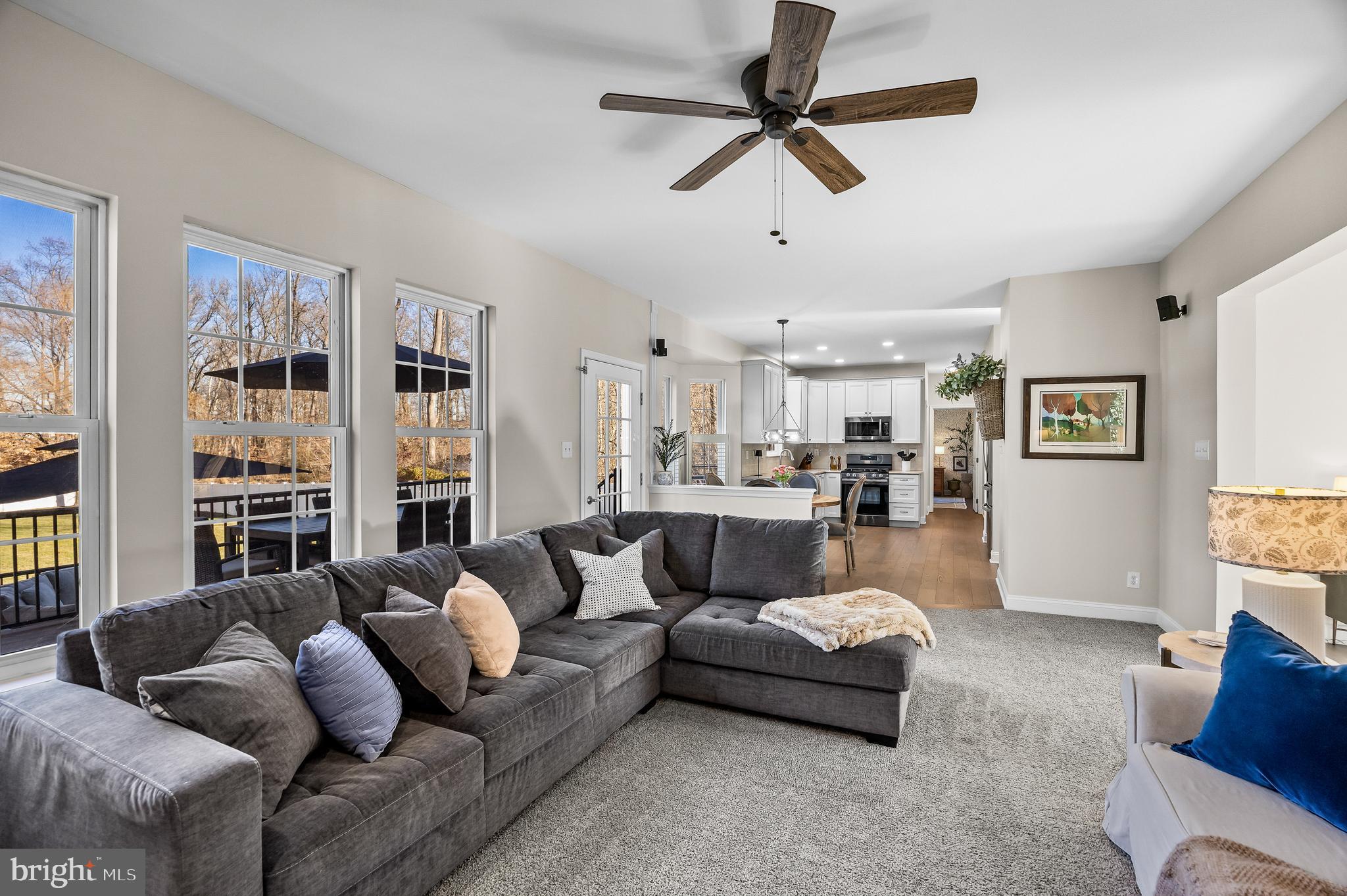 4907 Church Road Mount Laurel, NJ 08054 - Photo 12 of 49 a living room with furniture kitchen view and a window