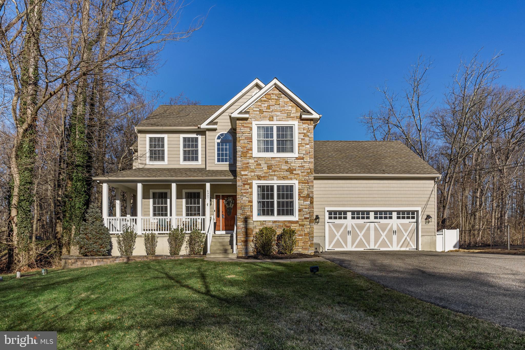 4907 Church Road Mount Laurel, NJ 08054 - Photo 3 of 49 a front view of a house with a yard