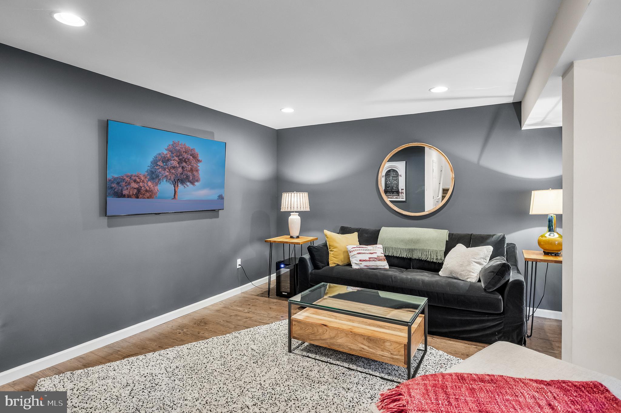 4907 Church Road Mount Laurel, NJ 08054 - Photo 31 of 49 a living room with furniture and a mirror