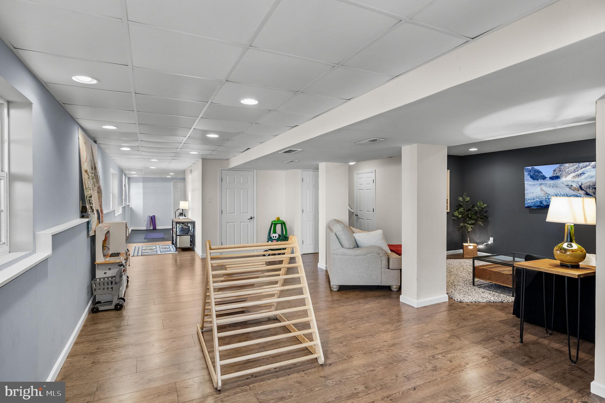 4907 Church Road Mount Laurel, NJ 08054 - Photo 34 of 49 a living room with furniture and a flat screen tv