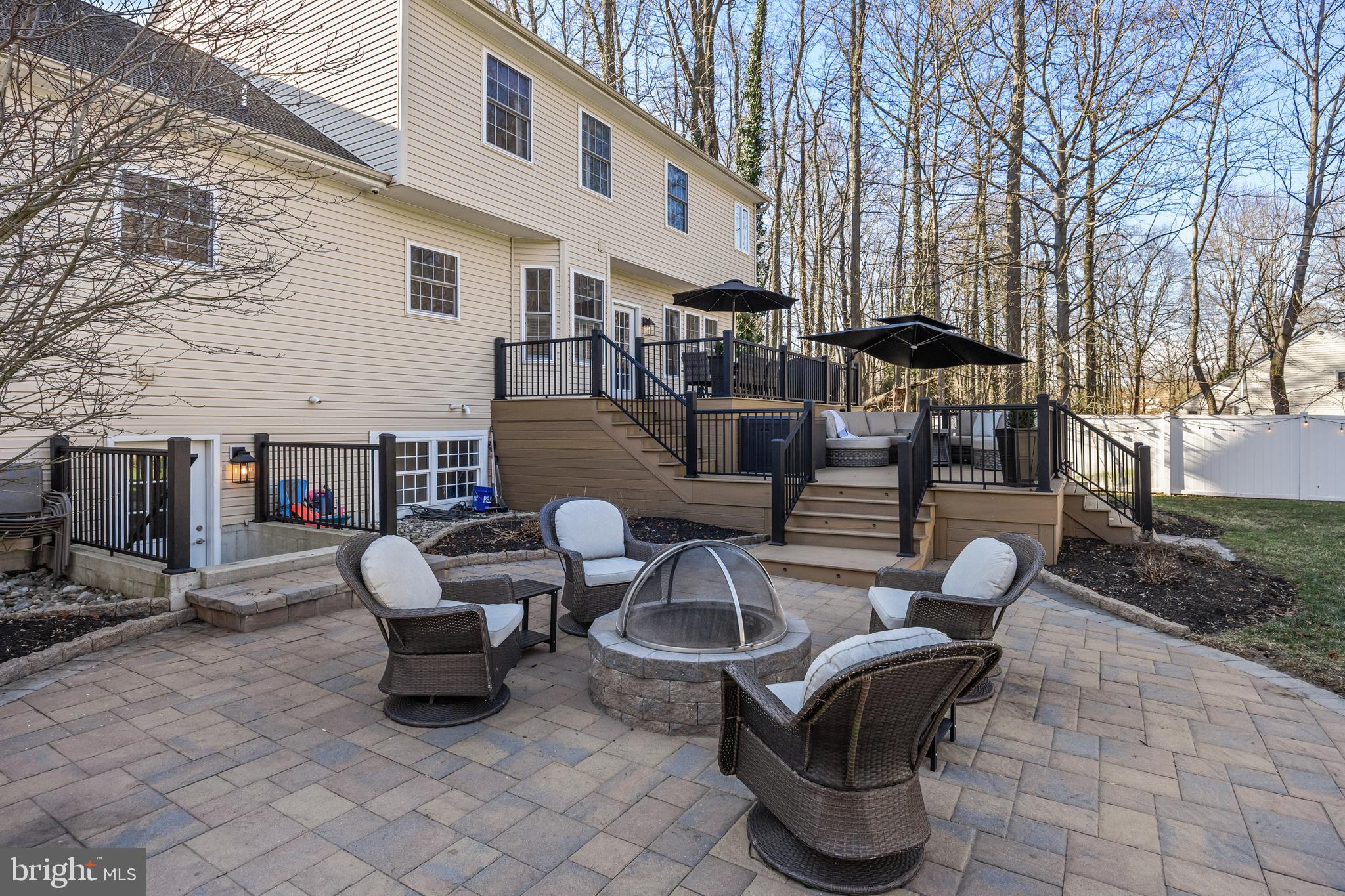 4907 Church Road Mount Laurel, NJ 08054 - Photo 40 of 49 a view of a patio with couches table and chairs and potted plants