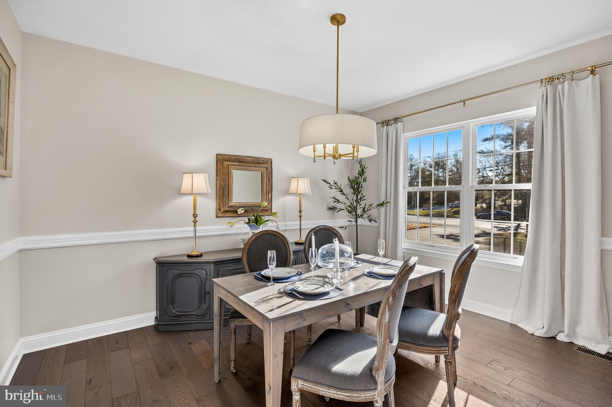 4907 Church Road Mount Laurel, NJ 08054 - Photo 8 of 49 a view of a dining room with furniture window and wooden floor