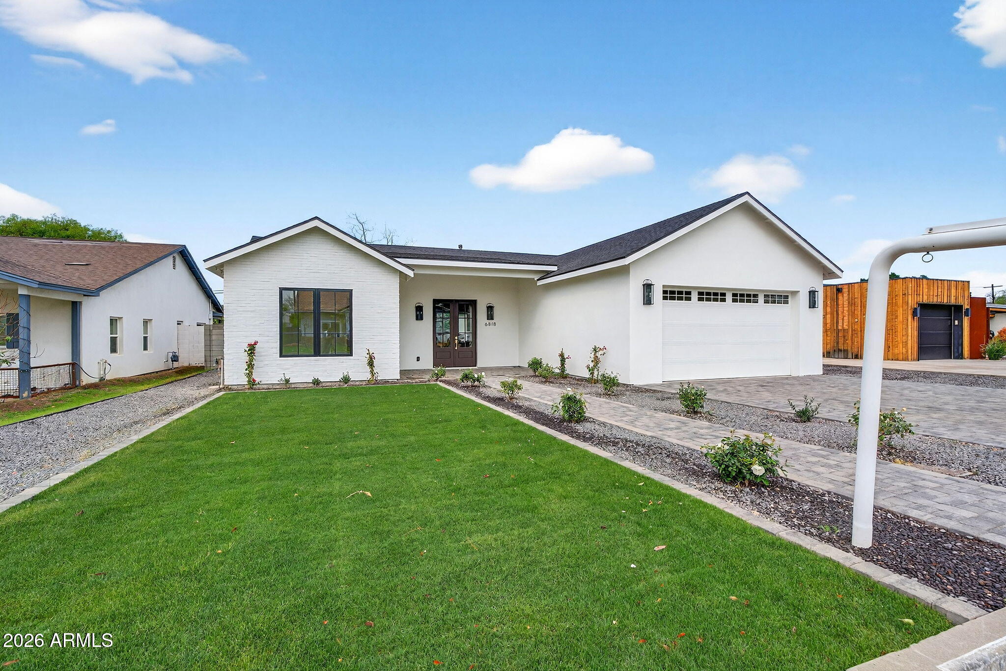 6818 North 13th Street Phoenix, AZ 85014 - Photo 2 of 65 a view of a house with a backyard