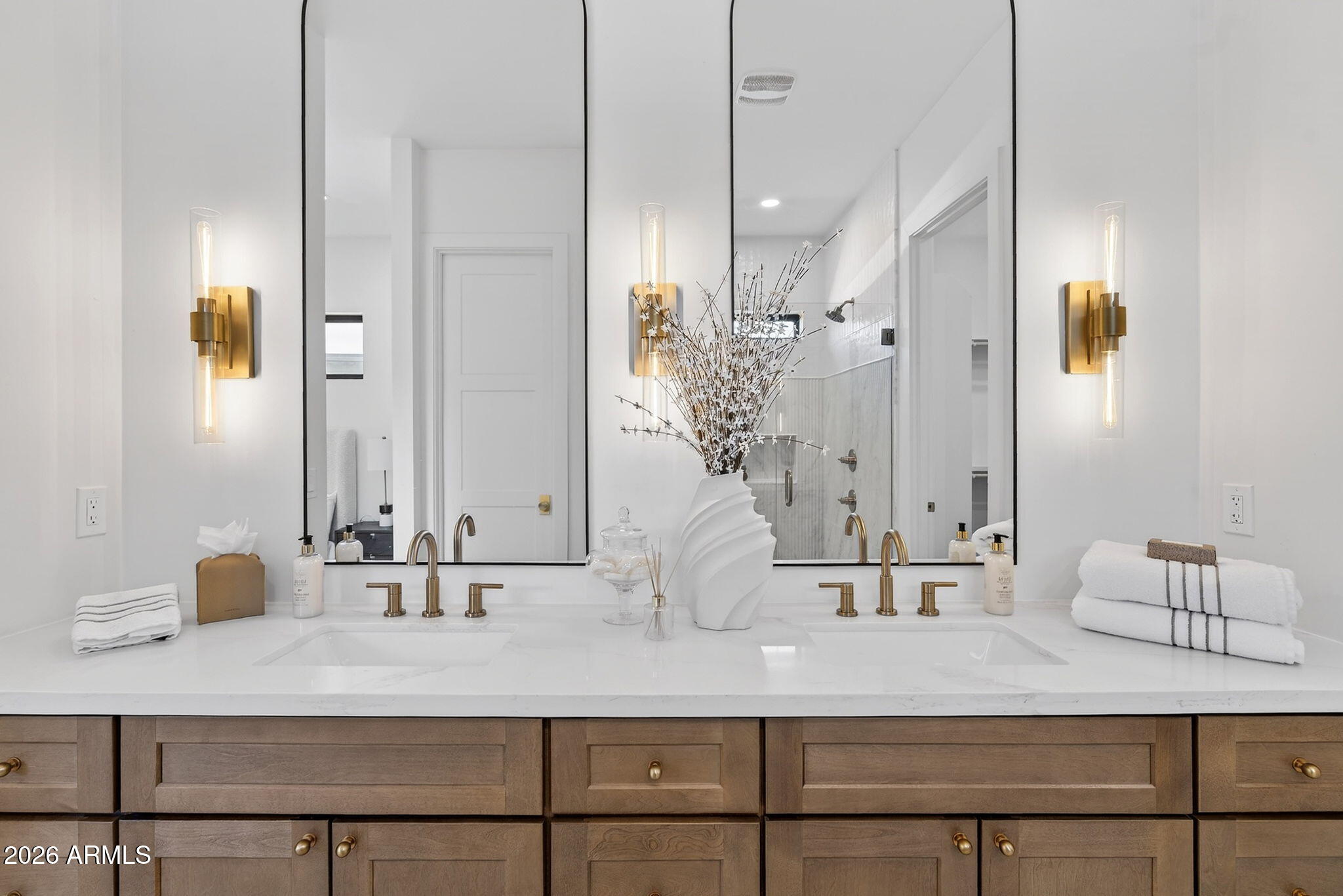 6818 North 13th Street Phoenix, AZ 85014 - Photo 36 of 65 a bathroom with a double vanity sink mirror and shower