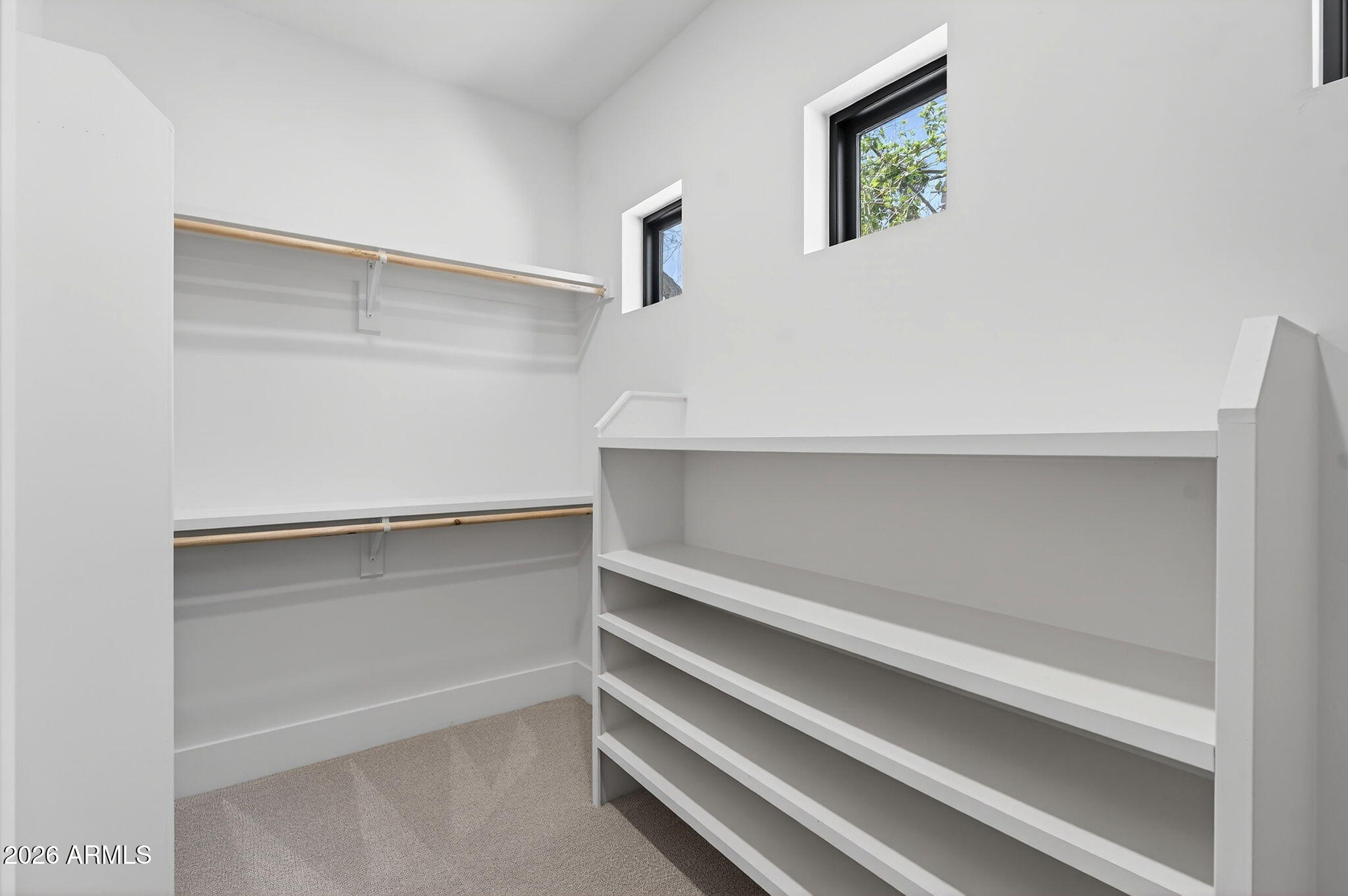 6818 North 13th Street Phoenix, AZ 85014 - Photo 38 of 65 a view of an empty walk in closet