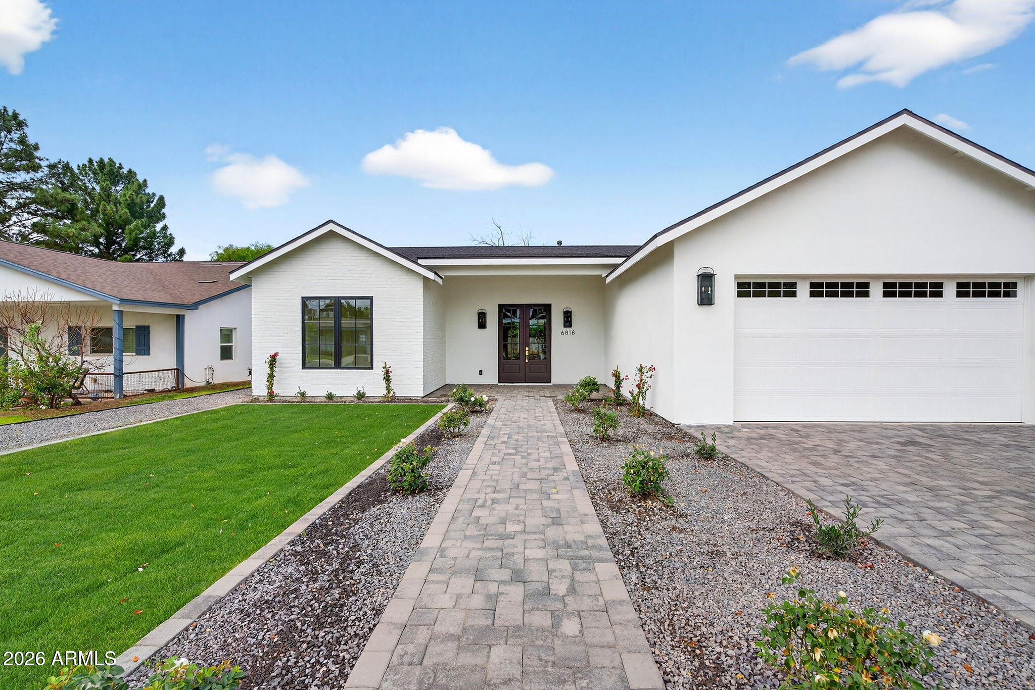 6818 North 13th Street Phoenix, AZ 85014 - Photo 4 of 65 a view of a house with a yard