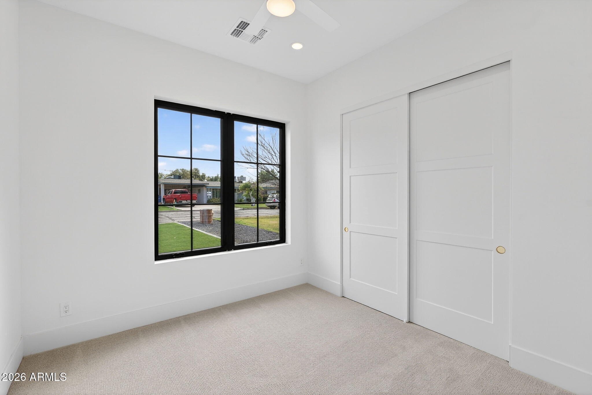 6818 North 13th Street Phoenix, AZ 85014 - Photo 45 of 65 a view of an empty room with a window