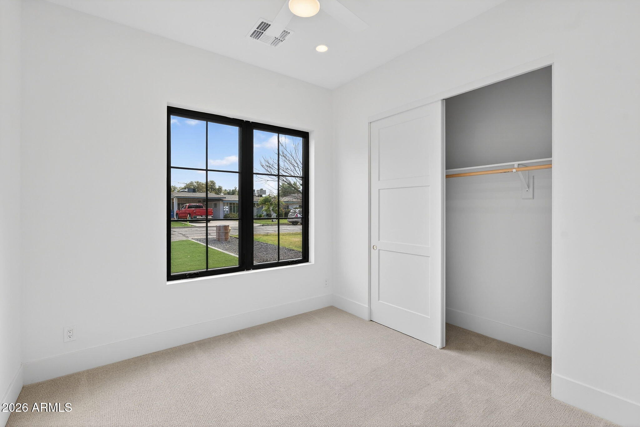 6818 North 13th Street Phoenix, AZ 85014 - Photo 46 of 65 a view of an empty room with a window