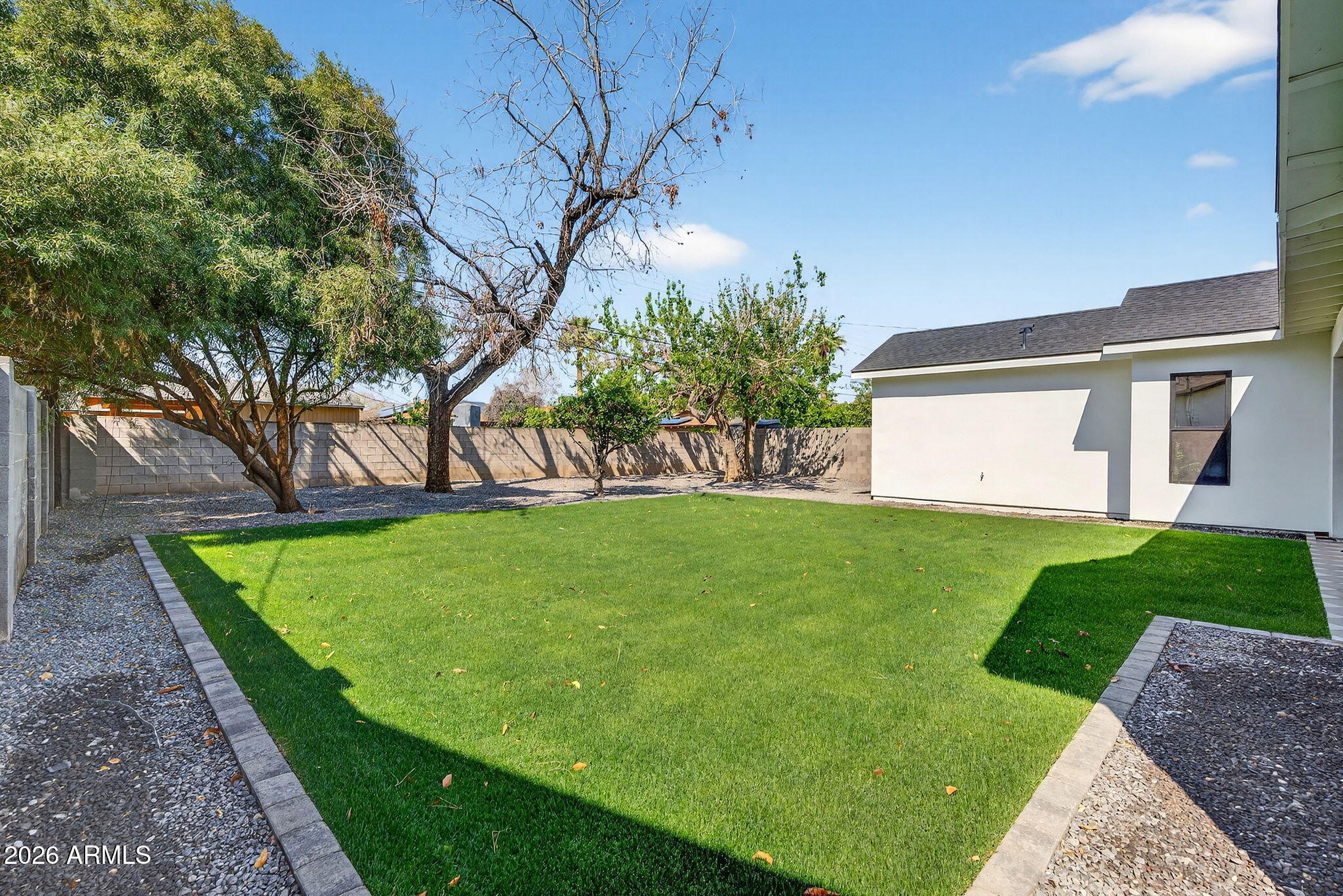 6818 North 13th Street Phoenix, AZ 85014 - Photo 58 of 65 a view of a backyard with a garden