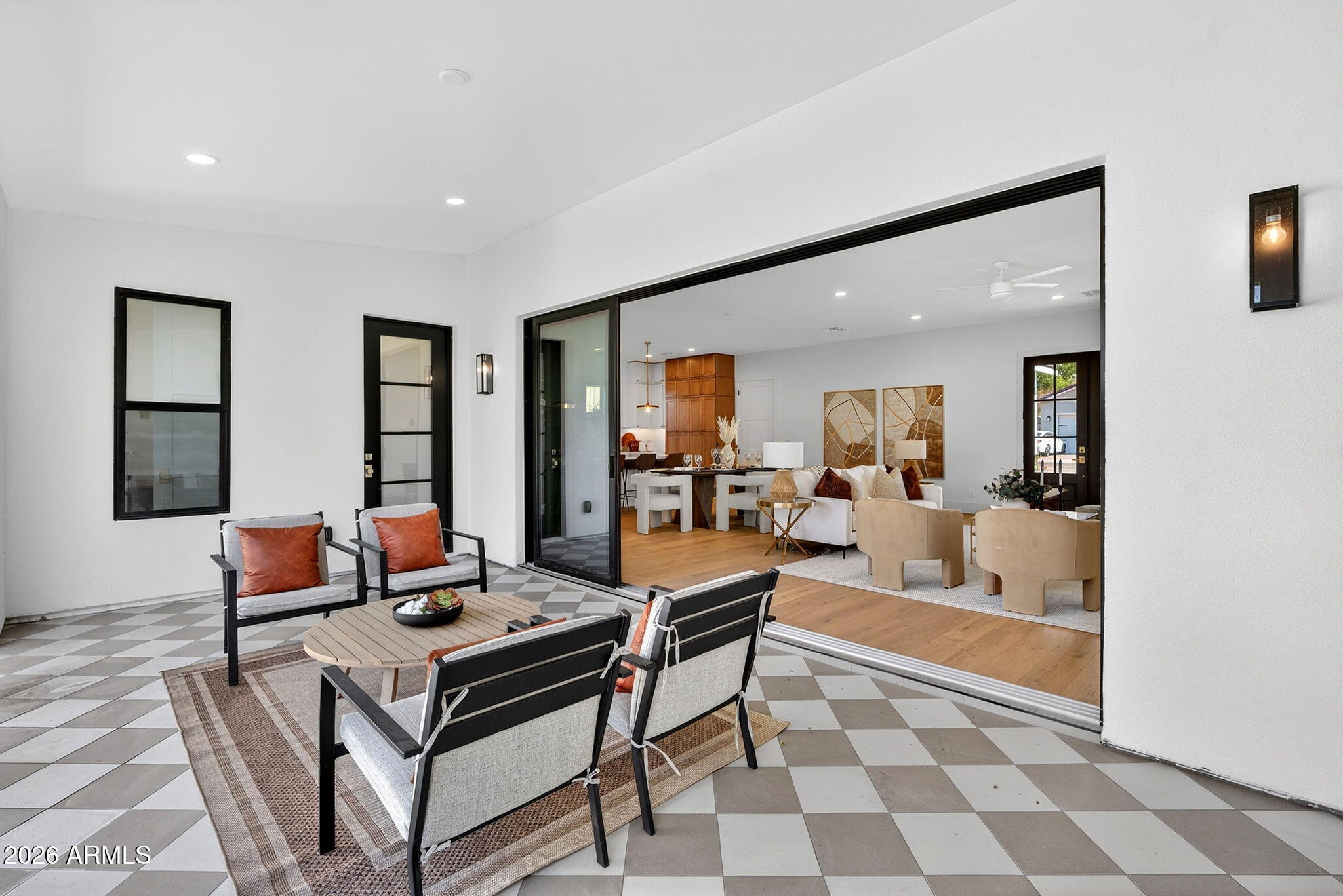 6818 North 13th Street Phoenix, AZ 85014 - Photo 62 of 65 a living room with furniture and a potted plant