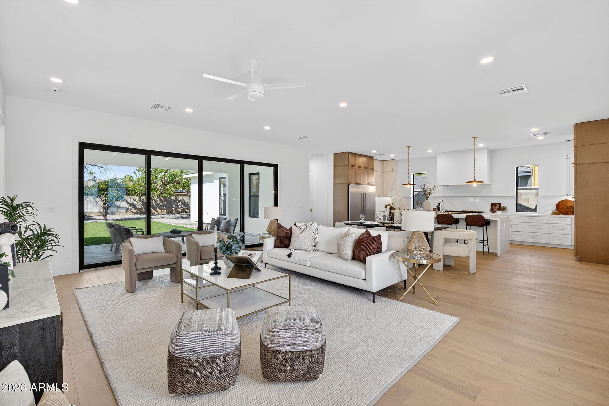 6818 North 13th Street Phoenix, AZ 85014 - Photo 7 of 65 a living room with furniture and a large window