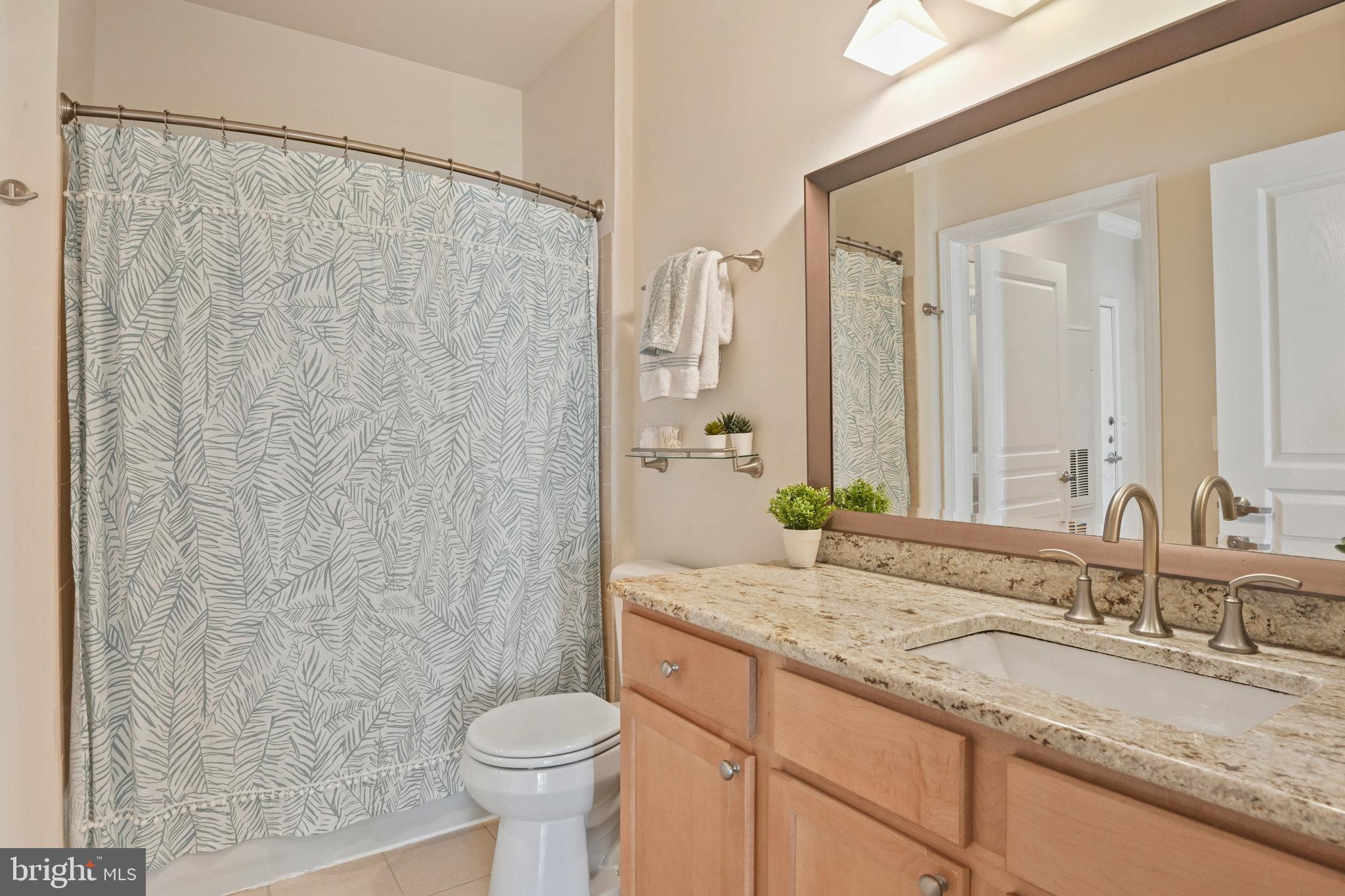 12000 Market Street, Unit 343 Reston, VA 20190 - Photo 23 of 46 Granite countertops in bathroom