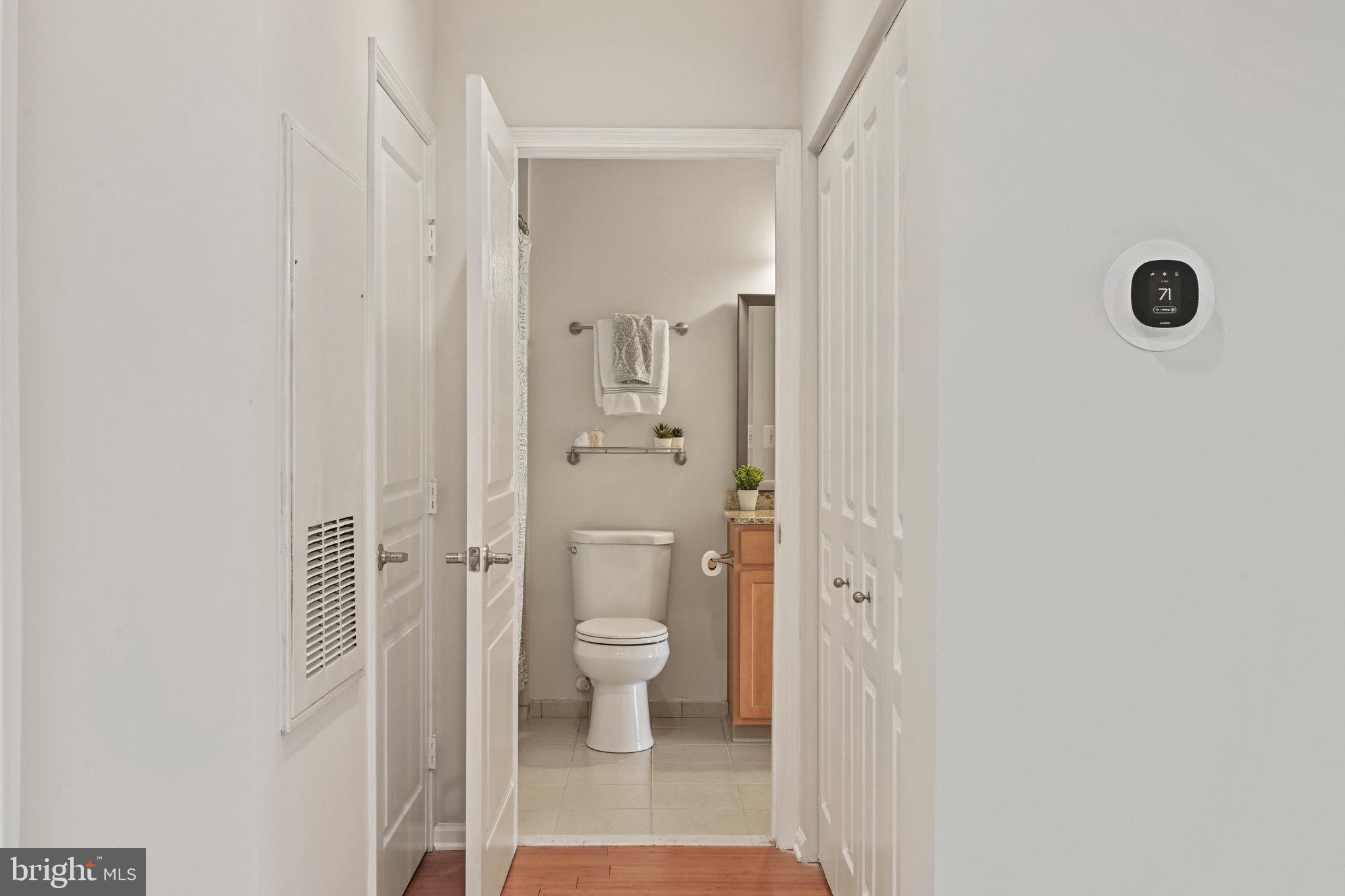 12000 Market Street, Unit 343 Reston, VA 20190 - Photo 26 of 46 Enter bathroom from the front hallway or bedroom