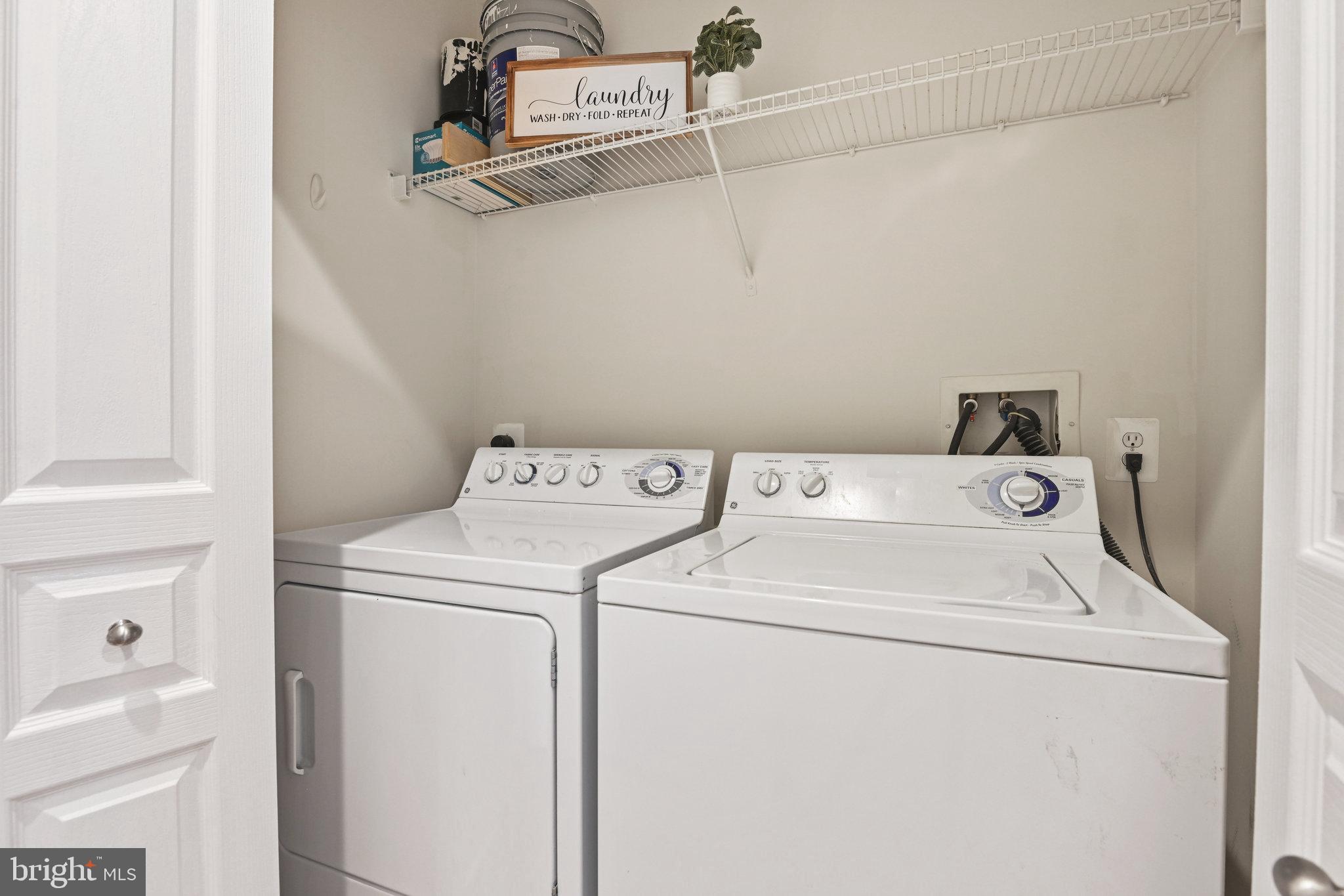 12000 Market Street, Unit 343 Reston, VA 20190 - Photo 27 of 46 Full sized washer and dyer in the laundry closet