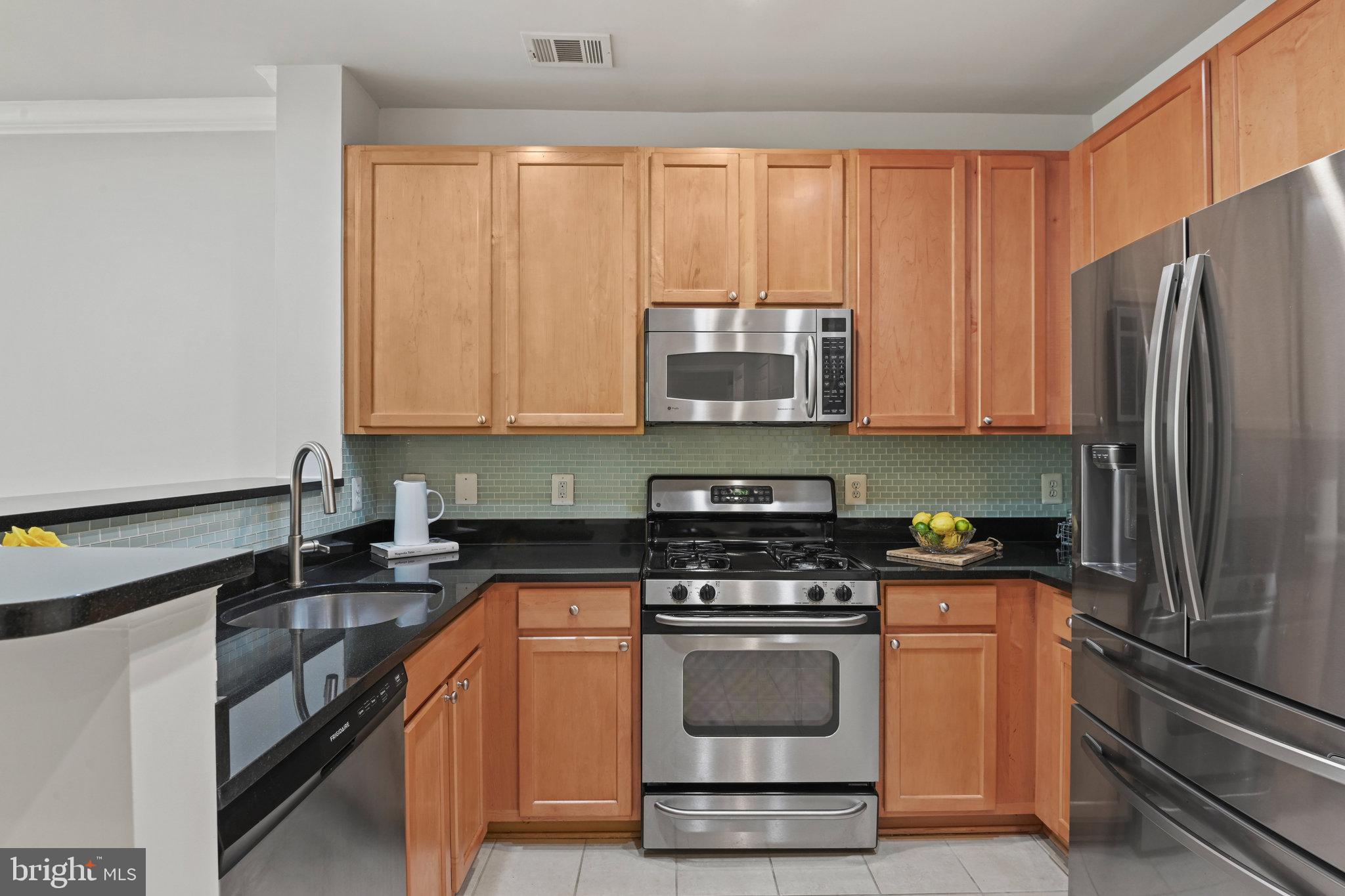 12000 Market Street, Unit 343 Reston, VA 20190 - Photo 3 of 46 Stainless steel appliances, granite countertops