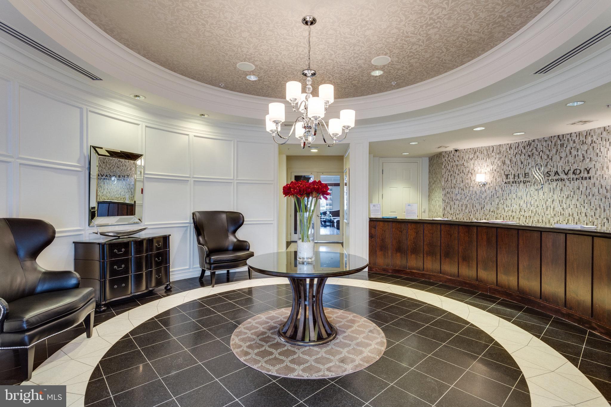 12000 Market Street, Unit 343 Reston, VA 20190 - Photo 39 of 46 Lobby reception desk