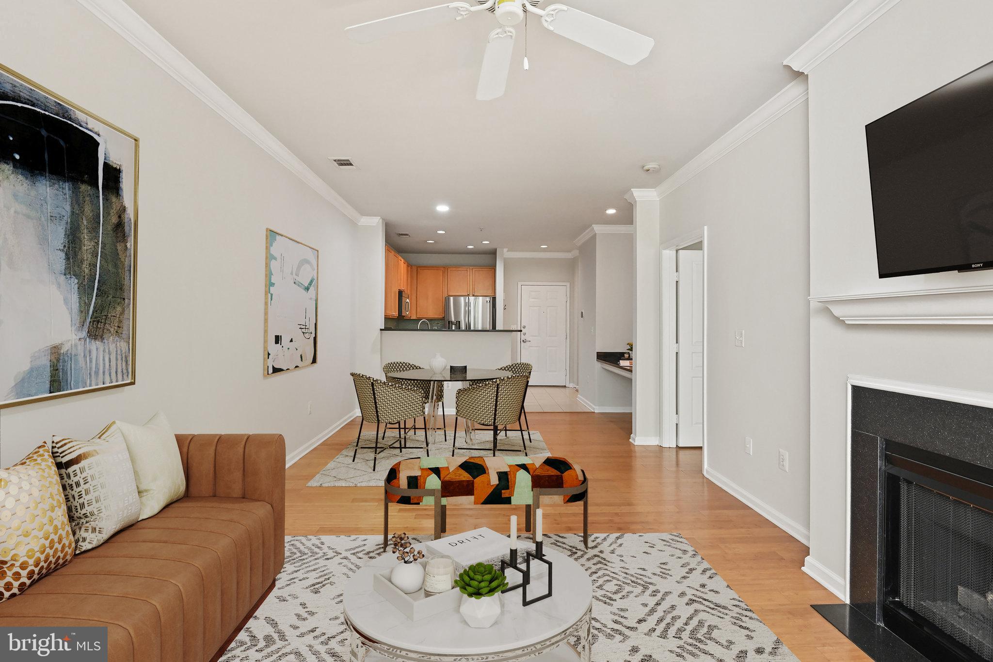 12000 Market Street, Unit 343 Reston, VA 20190 - Photo 9 of 46 Virtually staged Living/Dining spaces