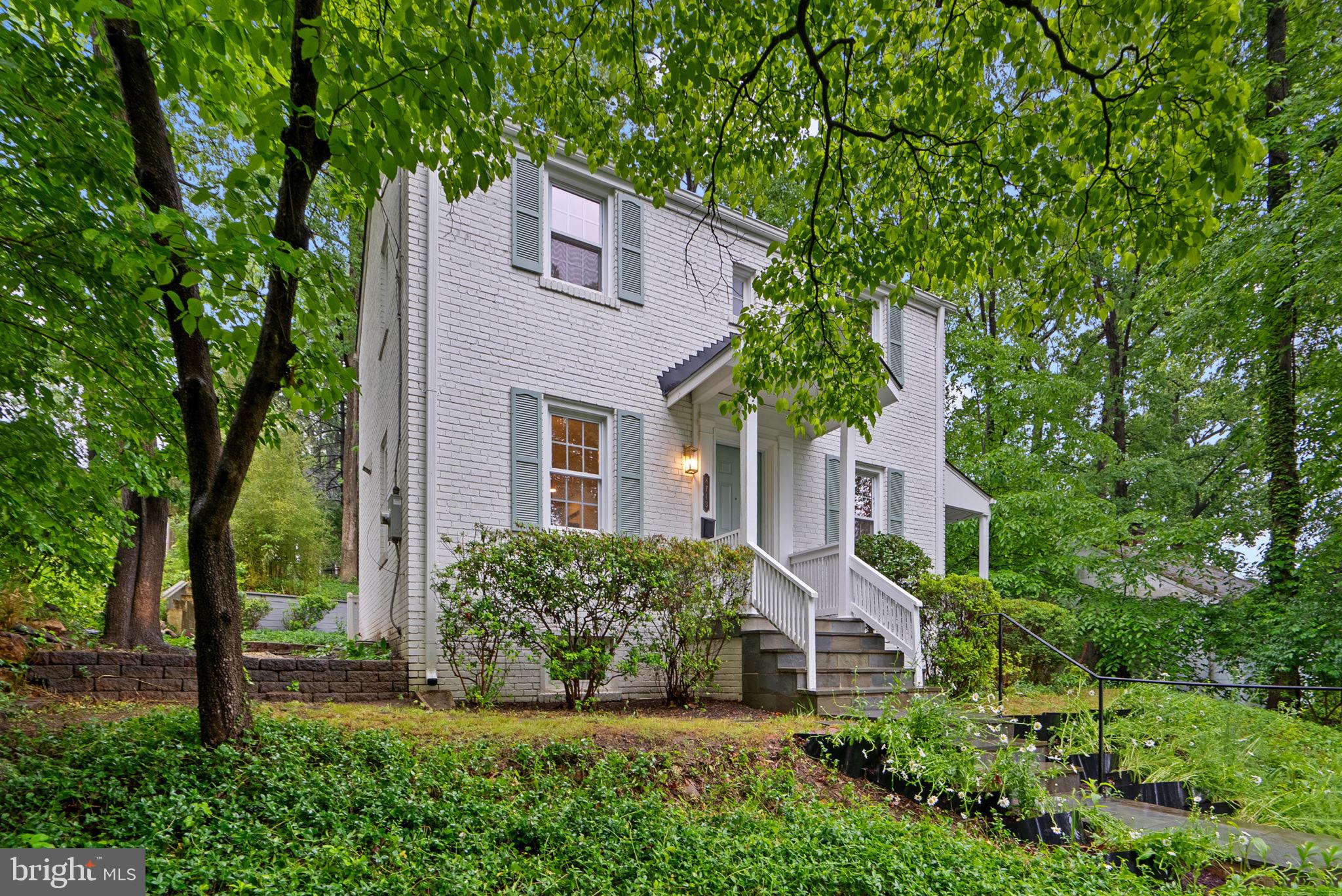 8713 Reading Road Silver Spring, MD 20901 - Photo 2 of 49 front view of a house with a yard