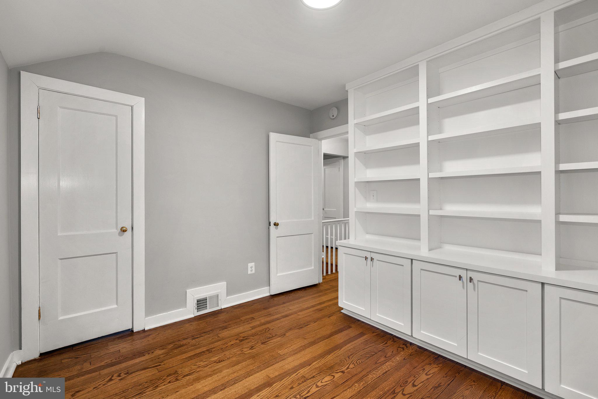 8713 Reading Road Silver Spring, MD 20901 - Photo 25 of 49 a view of an empty room with empty racks