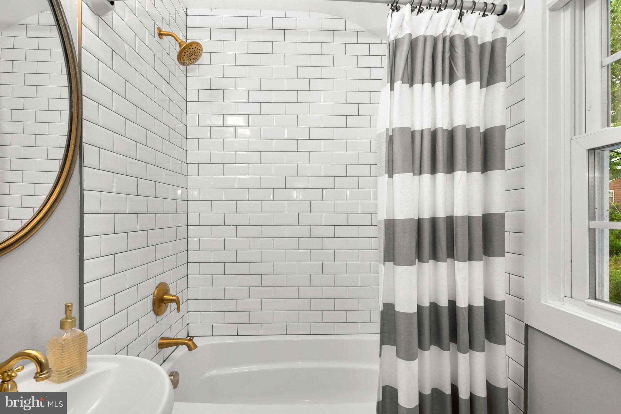 8713 Reading Road Silver Spring, MD 20901 - Photo 26 of 49 a bathroom with a shower