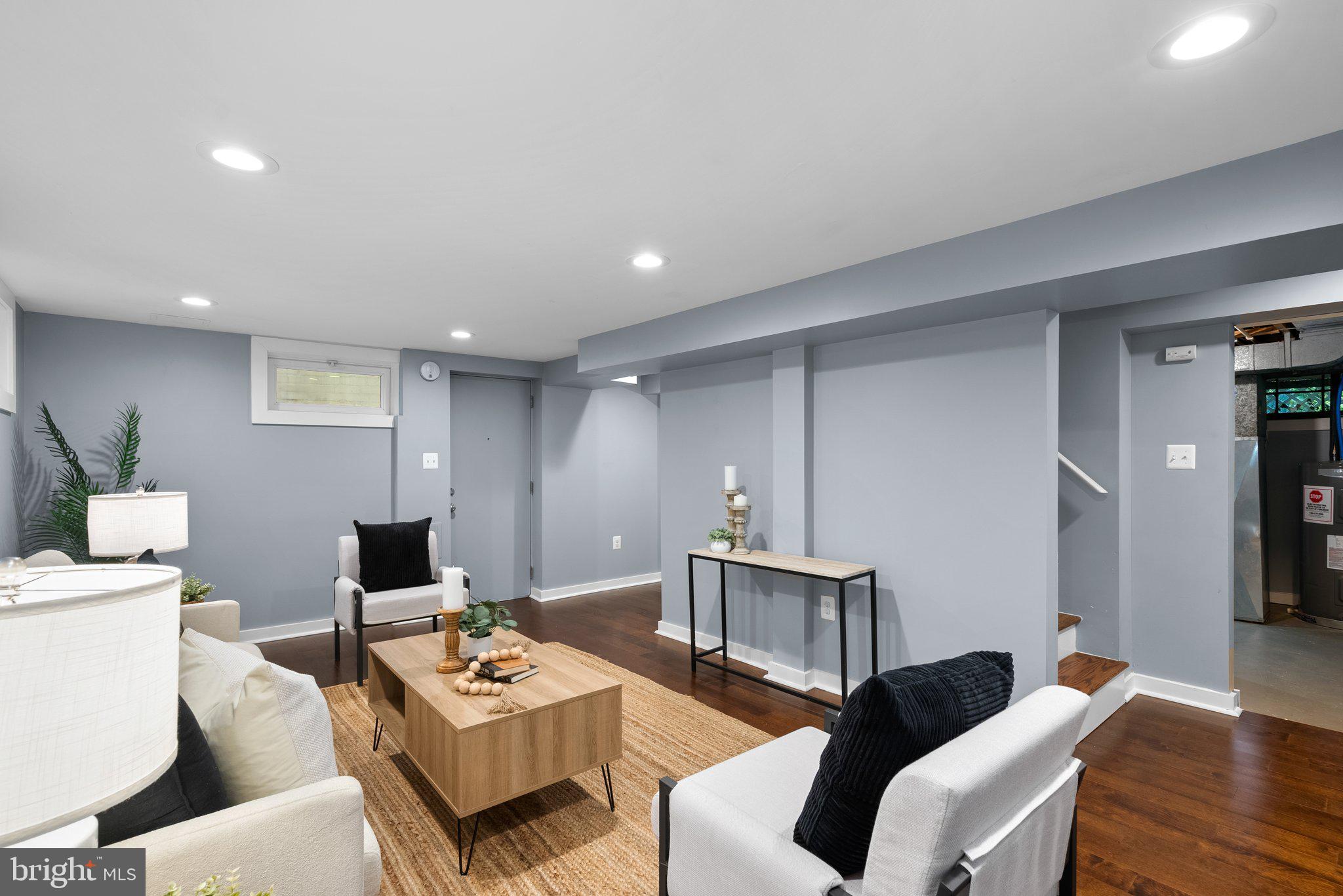 8713 Reading Road Silver Spring, MD 20901 - Photo 30 of 49 a work room with furniture and wooden floor