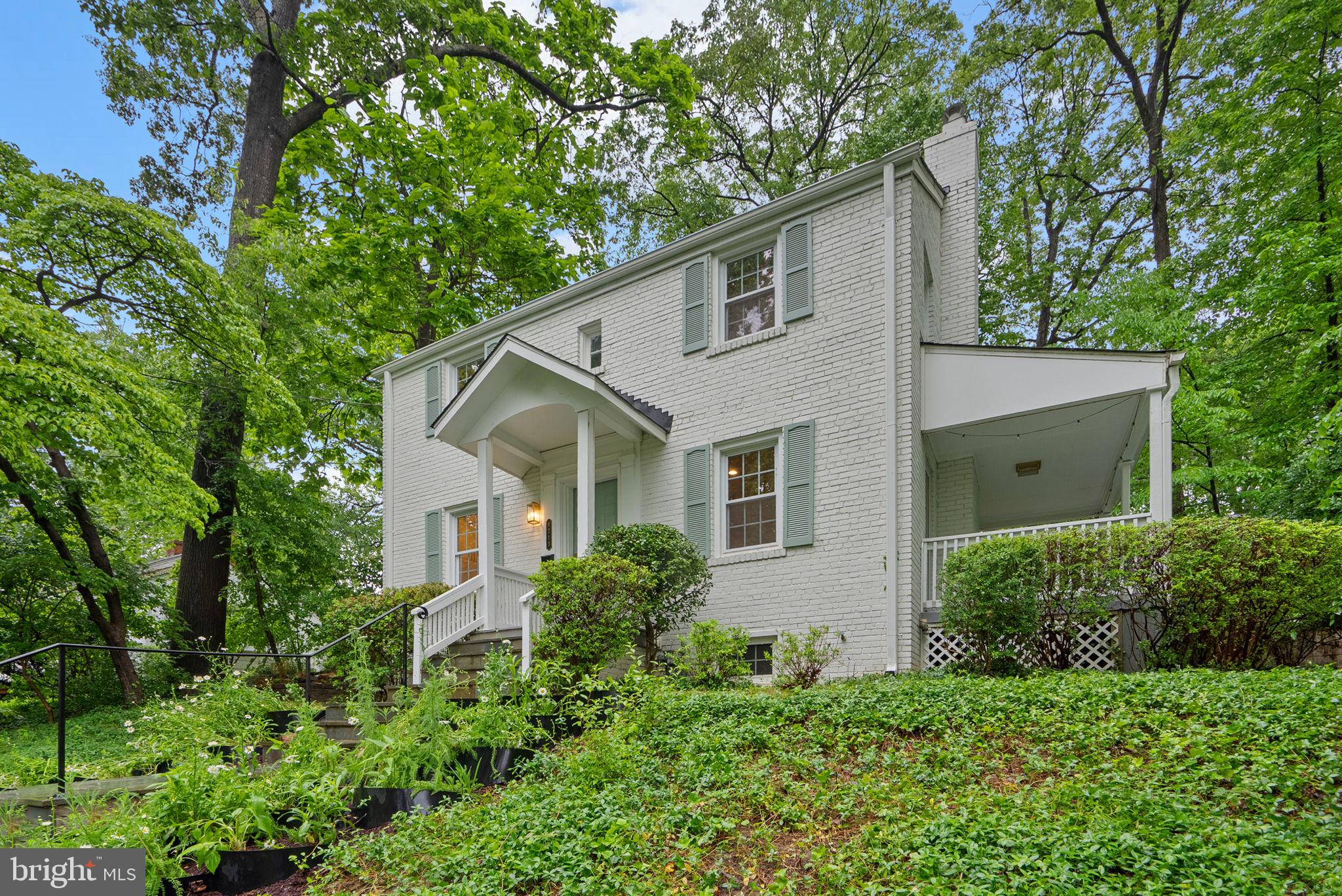 8713 Reading Road Silver Spring, MD 20901 - Photo 3 of 49 front view of a house with a yard