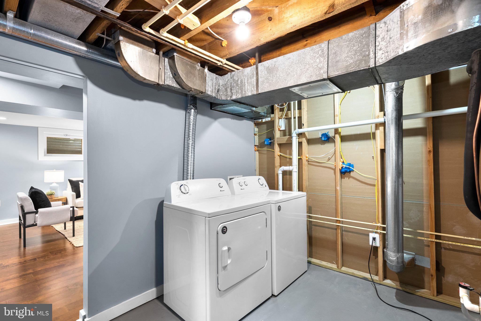 8713 Reading Road Silver Spring, MD 20901 - Photo 36 of 49 a utility room with dryer and washer