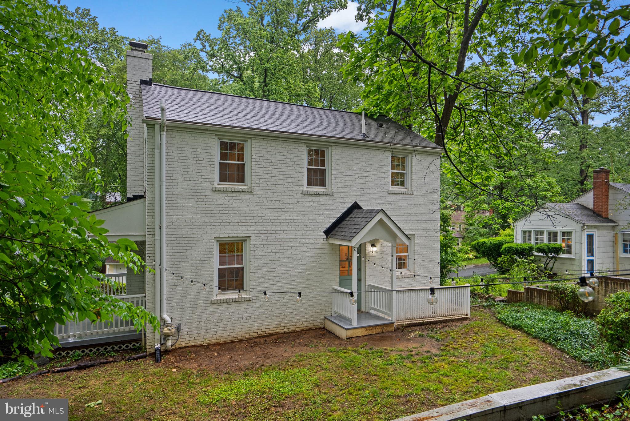 8713 Reading Road Silver Spring, MD 20901 - Photo 40 of 49 a front view of a house with a yard