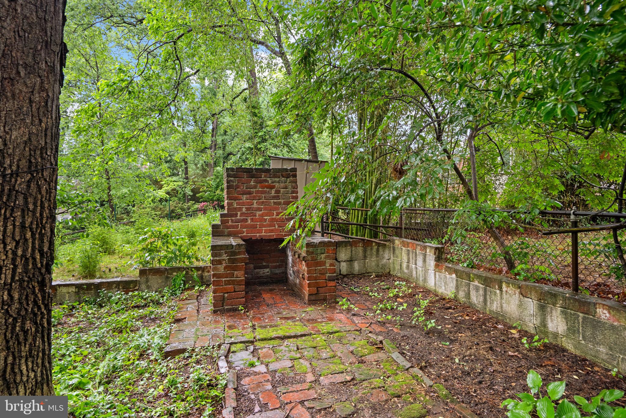 8713 Reading Road Silver Spring, MD 20901 - Photo 43 of 49 a view of a chair and table in the garden