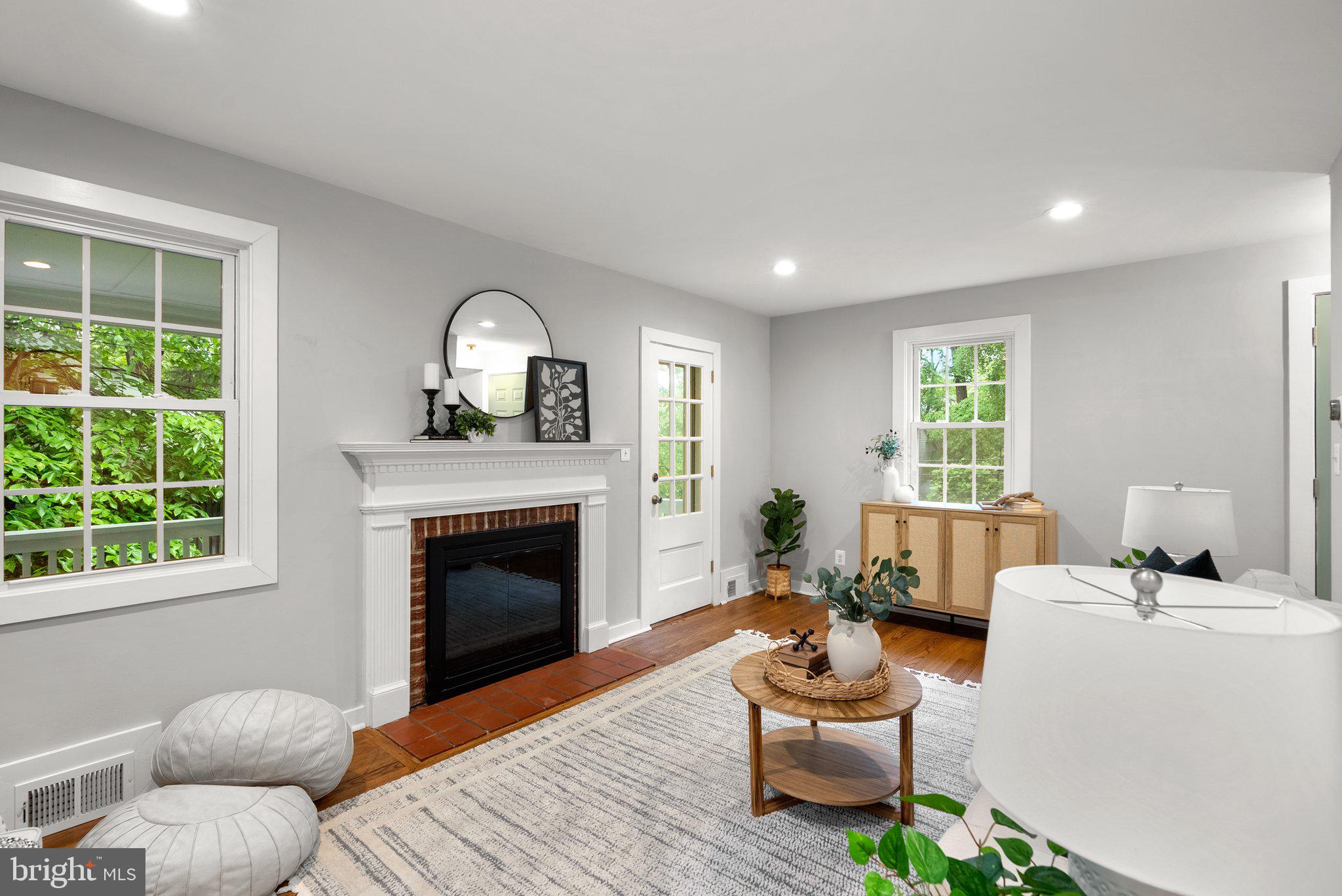 8713 Reading Road Silver Spring, MD 20901 - Photo 10 of 49 a living room with furniture and a fireplace