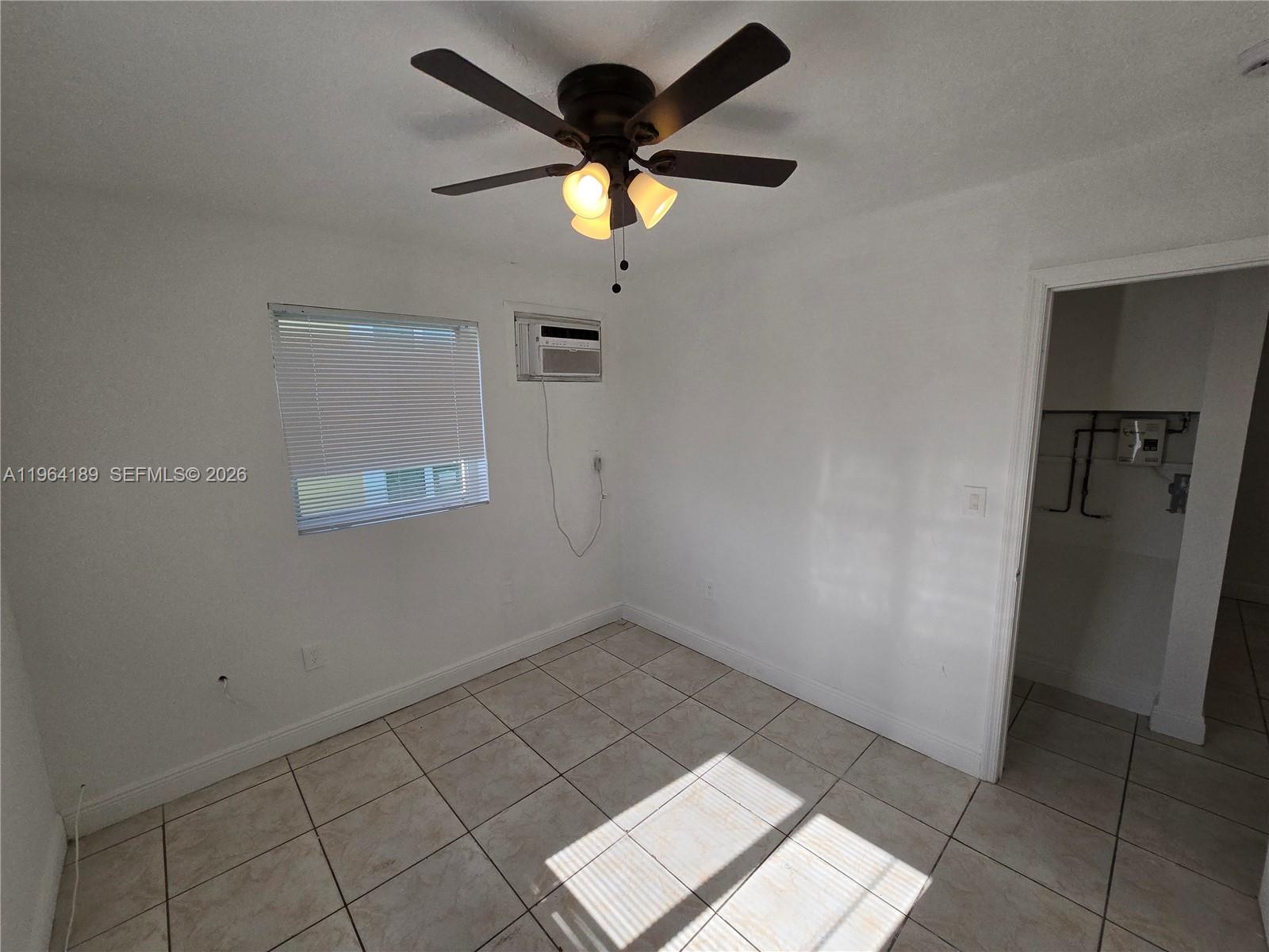 535 Northwest 7th Street, Unit 9 Miami, FL 33136 - Photo 11 of 22 a view of an empty room