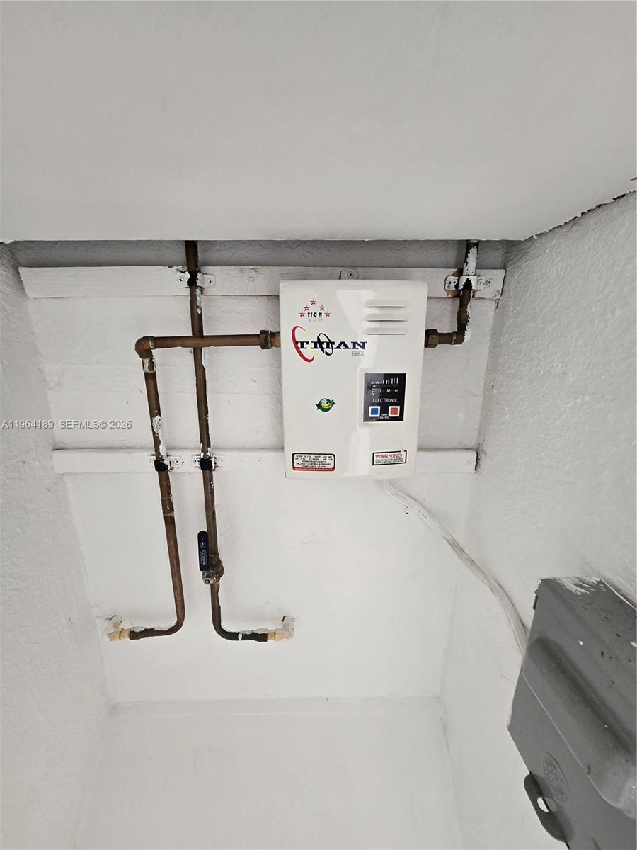 535 Northwest 7th Street, Unit 9 Miami, FL 33136 - Photo 21 of 22 view of utility room