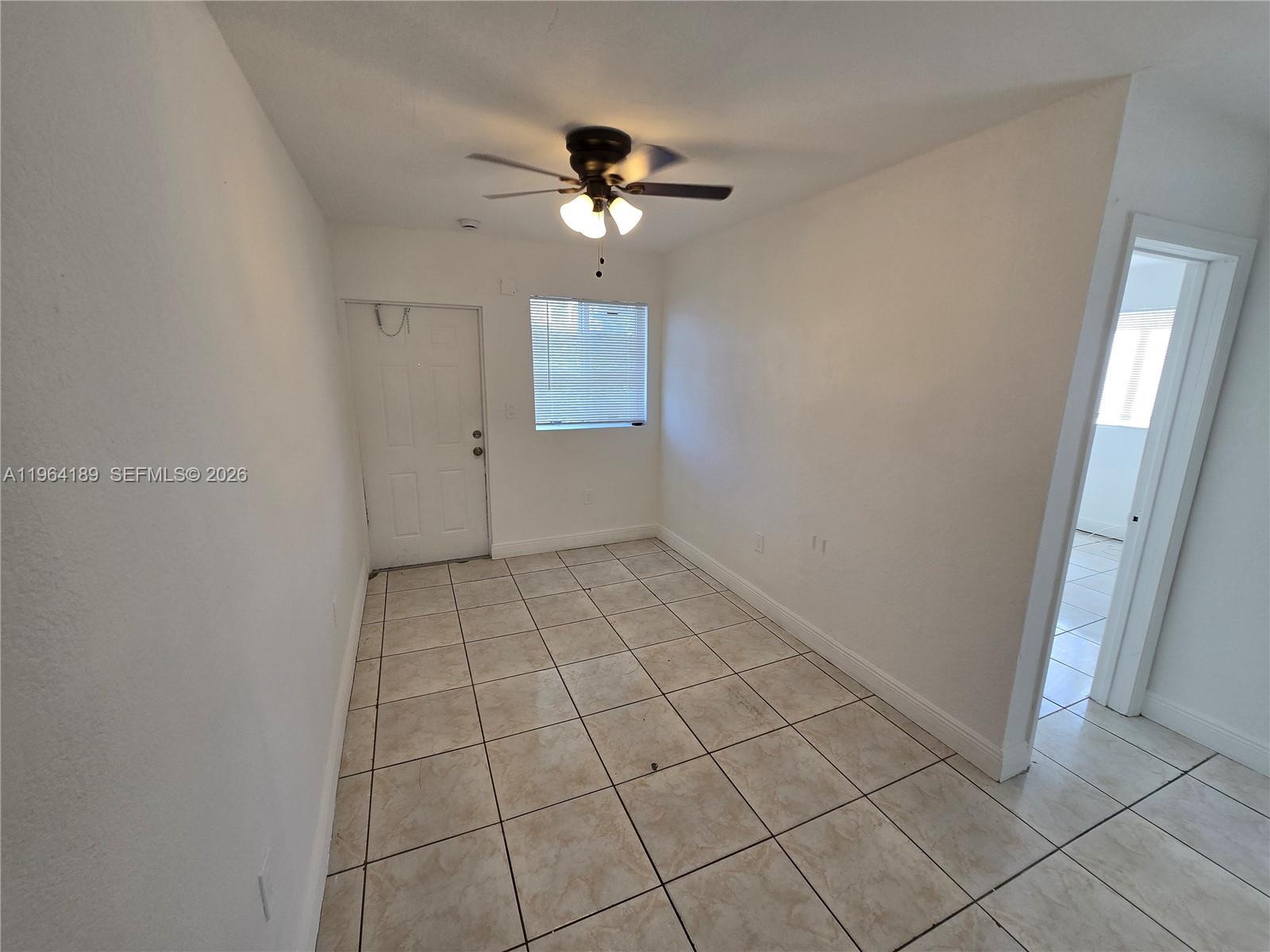 535 Northwest 7th Street, Unit 9 Miami, FL 33136 - Photo 7 of 22 a view of an empty room
