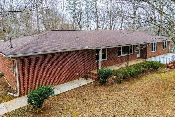 a house view with a garden space