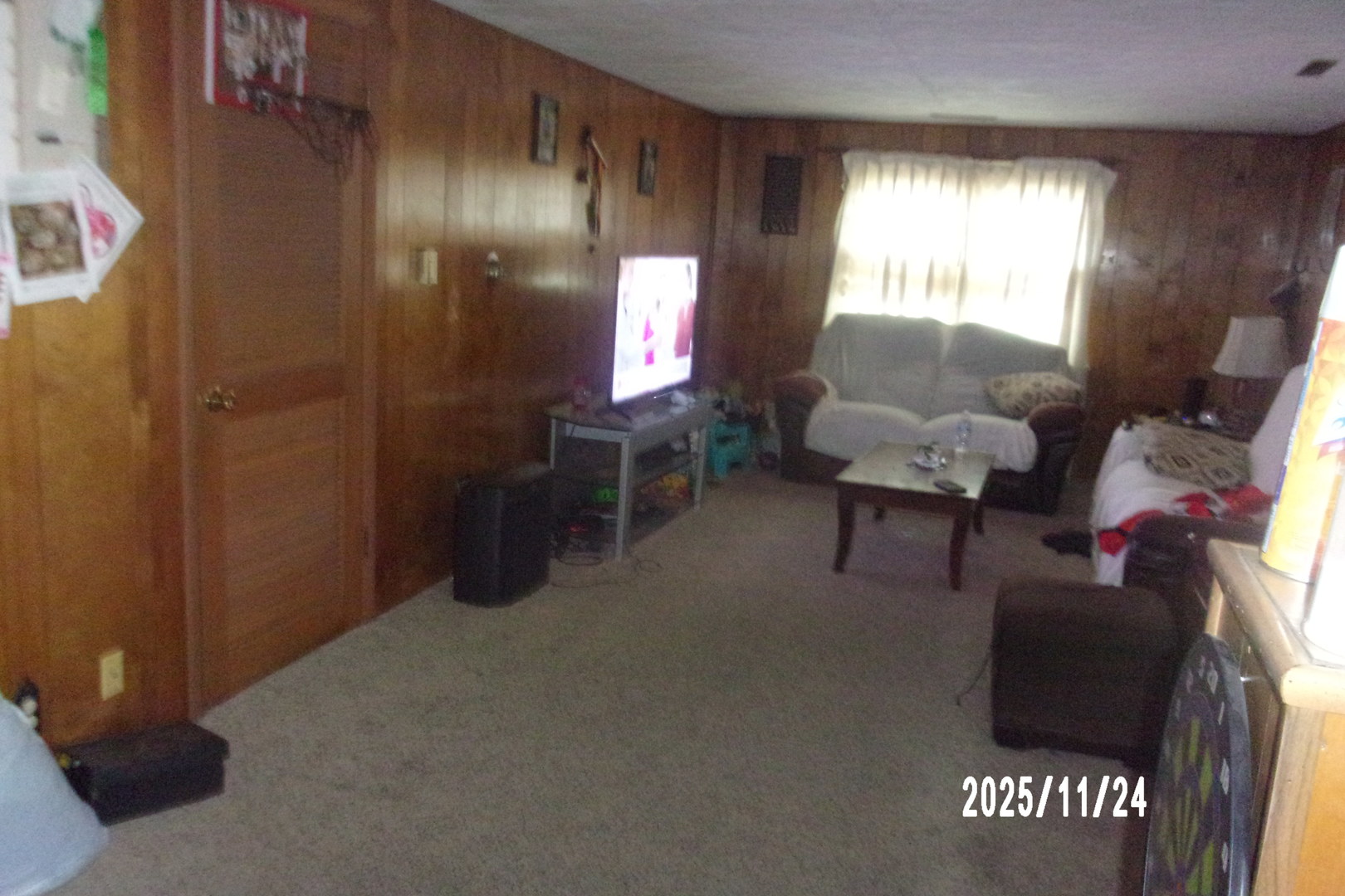 431 South 5th Street Watseka, IL 60970 - Photo 6 of 11 a living room with furniture and a window