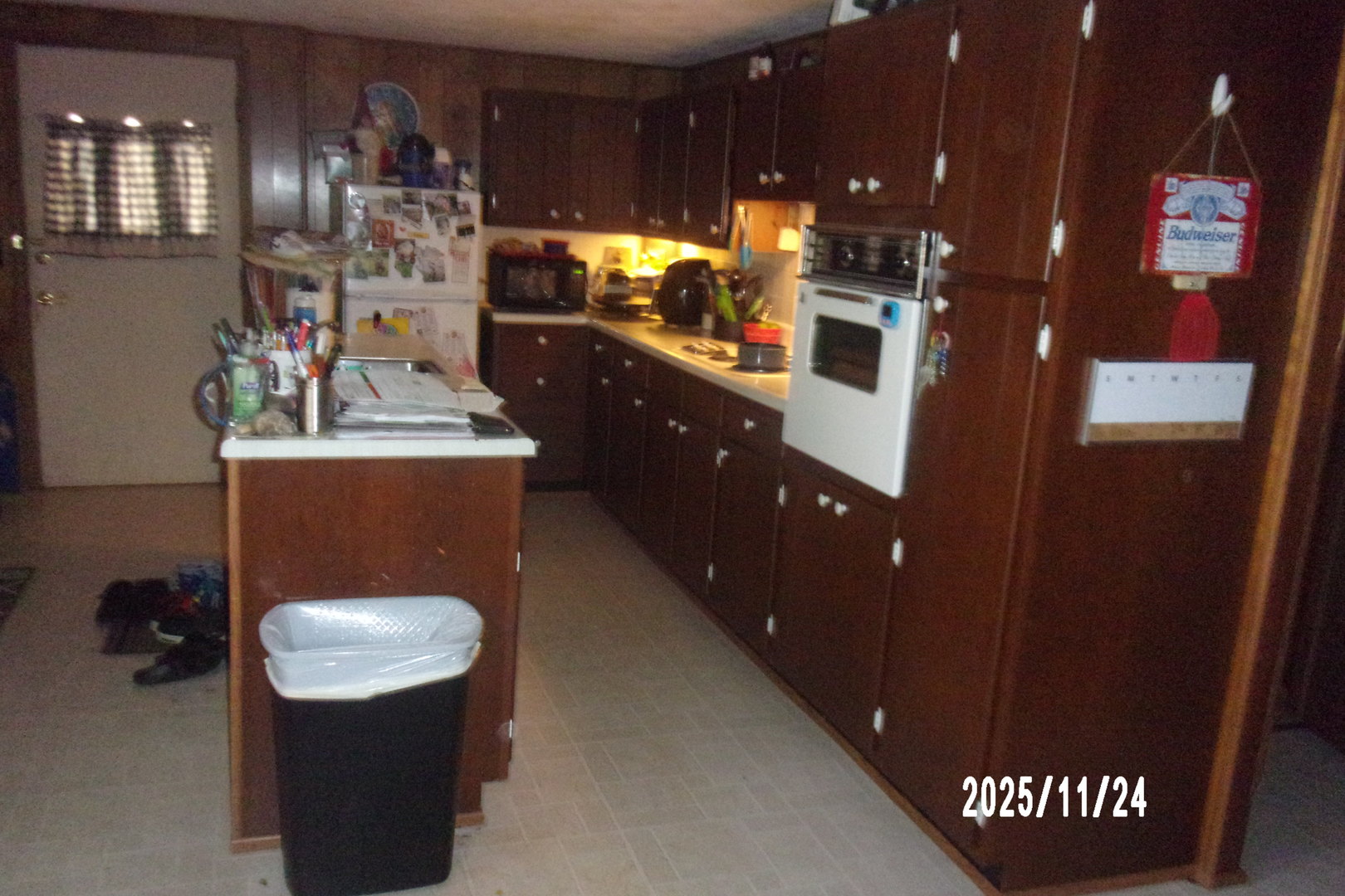 431 South 5th Street Watseka, IL 60970 - Photo 9 of 11 a kitchen with stainless steel appliances granite countertop a sink a stove and a refrigerator