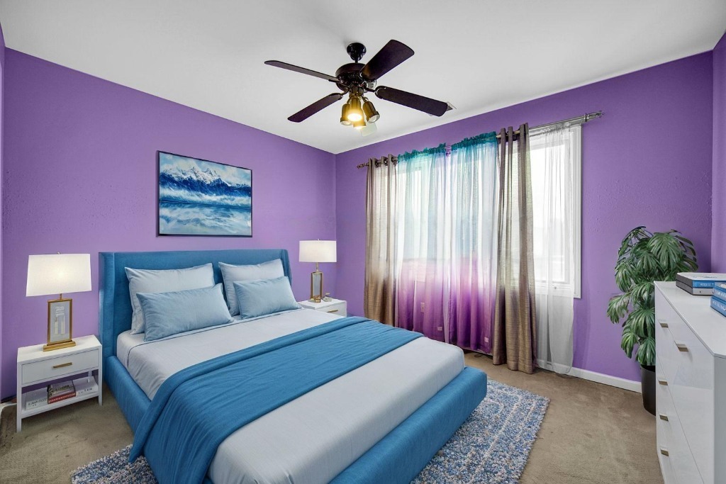 15516 Frontage Road Markham, IL 60428 - Photo 28 of 36 a bedroom with a bed and a chandelier