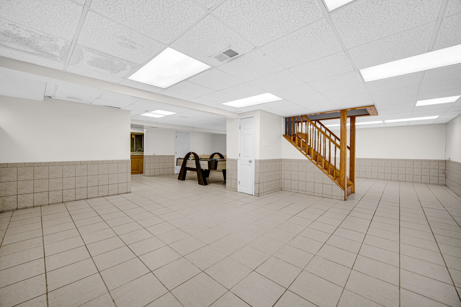 15516 Frontage Road Markham, IL 60428 - Photo 33 of 36 a view of a livingroom with an entryway and a ceiling fan