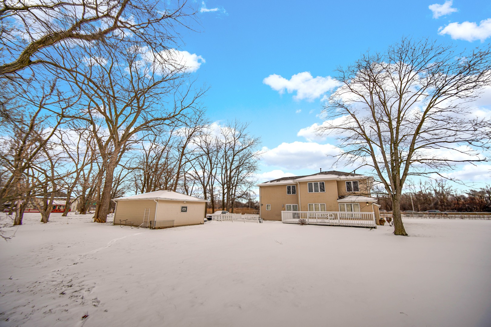 15516 Frontage Road Markham, IL 60428 - Photo 36 of 36 a house with trees in front of it