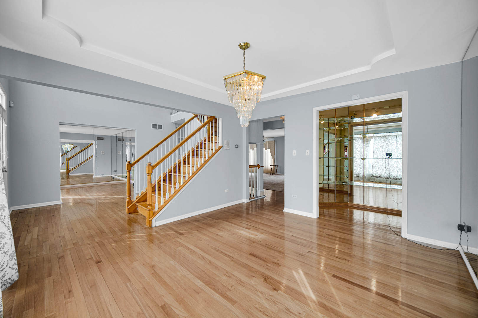 15516 Frontage Road Markham, IL 60428 - Photo 6 of 36 a view of an entryway with wooden floor